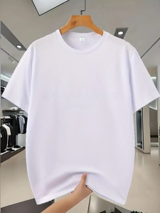 Detail of white men's T-shirt showing breathable honeycomb fabric texture and neckline tag