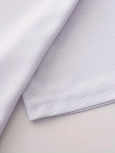 Macro detail of white quick-dry breathable honeycomb mesh fabric with double stitching