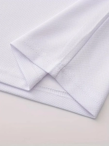 Detailed close-up of double-stitched hem on white breathable mesh sport t-shirt