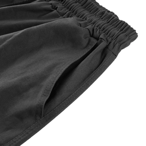Détail de pantalon cargo pour homme avec taille élastique à cordon et poches latérales