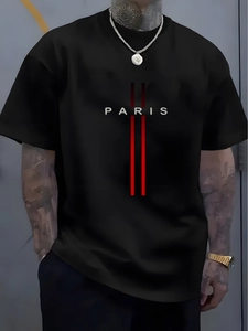 Detailed close-up of white PARIS letter print and red stripes on black cotton T-shirt