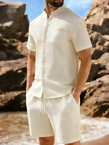 Men's off-white waffle texture two-piece set featuring short sleeve shirt and drawstring shorts