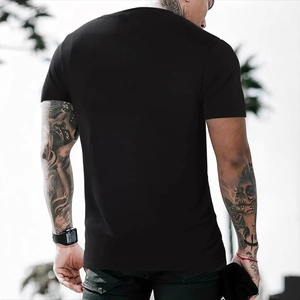 Back view of a classic black short-sleeve men's slim-fit T-shirt with a round neck design