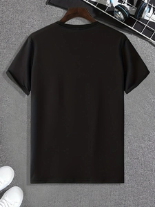 Macro detail of the premium black cotton t-shirt back with a smooth fabric texture
