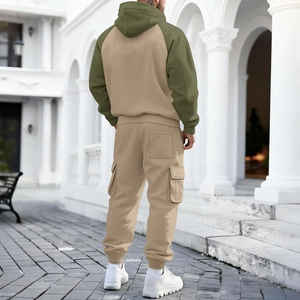 Rear view of two-tone hooded sweatshirt and cargo jogger pants with large side pockets