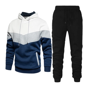Detailed flat lay of men's three-color hooded sweatshirt and black drawstring joggers set