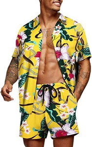 Close-up of tropical floral print on yellow summer shirt and drawstring shorts set