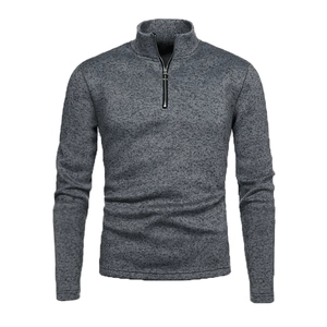 Detailed close-up of a men's heather grey half-zip knit sweater with metal ring puller