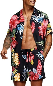 Detail of men's black Hawaiian floral shirt set with vibrant tropical hibiscus prints