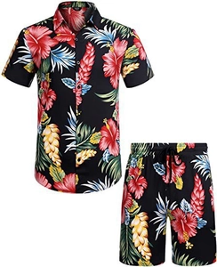 Close-up of tropical floral print on black summer casual shirt and drawstring shorts