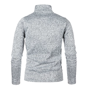 Macro view of the back of a slim-fit knit sweater with stand collar in heather gray