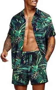 Close-up of tropical palm leaf print on breathable men's beach shirt and drawstring shorts