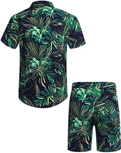 Detail of loose-fit Hawaiian set featuring tropical palm leaf print on shirt and shorts