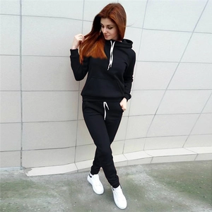 Women's black fleece tracksuit set with drawstring hoodie and jogger pants for sports