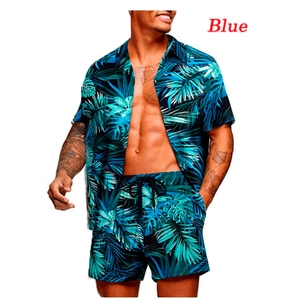 Detail view of men's blue Hawaiian summer set with tropical green palm leaf patterns