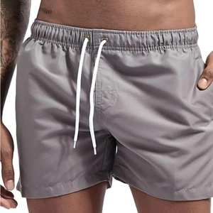 Men's grey quick-dry beach shorts with elastic waist, contrast drawstrings and side pockets