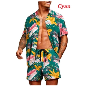 Detail of cyan Hawaiian short sleeve shirt and shorts set with tropical floral print