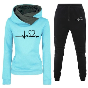 Women's light blue hoodie and black jogger set featuring heartbeat pulse graphic print