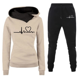 Women's heartbeat print tracksuit set featuring beige hooded sweatshirt and black pants
