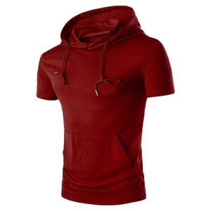 Detail view of burgundy short-sleeve hoodie showing fabric texture and kangaroo pocket
