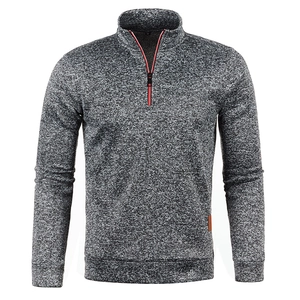 Detail of 1/4 zip collar and grey knit fabric texture on men's pullover sweater