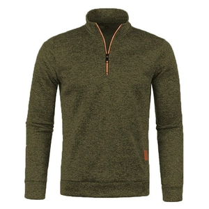 Detail view of half-zip knit sweater with contrast orange trim and marled fabric