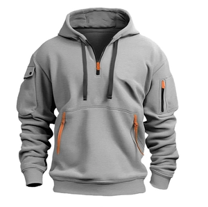 Close-up of grey men hoodie with orange zippers, multi-pocket design and knit texture