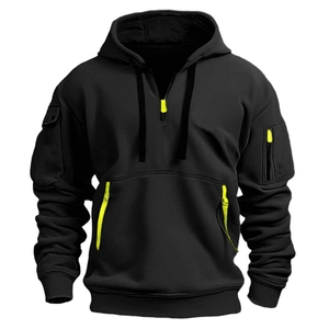 Detail of black tactical hoodie with fluorescent yellow zippers and utility arm pockets