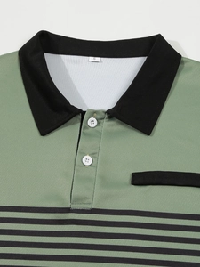 Macro detail of men's green polo shirt with black striped chest and button collar