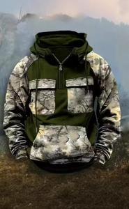Detail of army green hoodie featuring camouflage raglan sleeves and tactical utility pockets