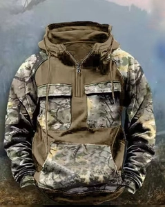 Detail of outdoor camouflage hoodie featuring utility pockets and khaki patchwork design