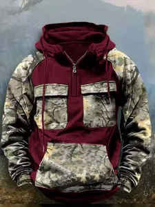 Men's burgundy hoodie with camouflage patchwork pockets and adjustable drawstring hood