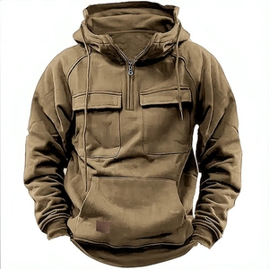 Detail of khaki tactical hoodie featuring chest flap pockets and a half-zip closure