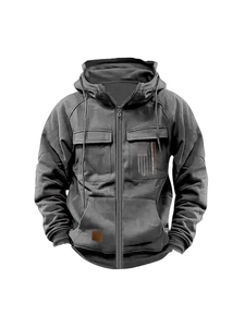 Dark grey zip-up hoodie with American flag print and functional pockets in casual loose fit