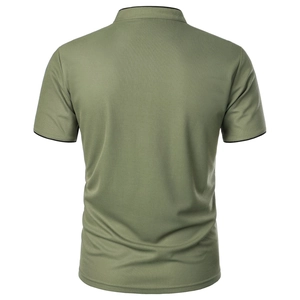 Macro view showing the olive green piqué fabric and black contrast trim on the polo shirt