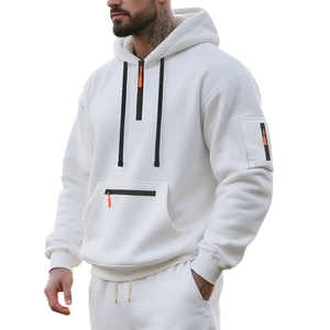 Detail of white men's heavy fleece hoodie featuring a 1/4 zip and orange accents
