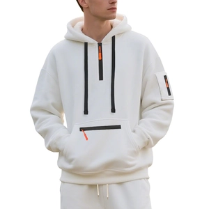 Detail of white men's hoodie featuring orange zipper accents and functional sleeve pocket