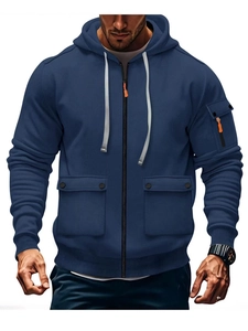 Detail view of navy blue hoodie featuring functional zipper and multiple utility pockets