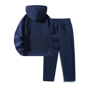 Navy blue two-piece tracksuit featuring back view of oversized hoodie and wide-leg sweatpants