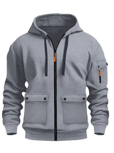 Detail view of men's grey hoodie with multi-pockets and contrast orange zipper pull