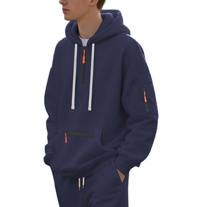 Detail of navy men hoodie with orange zipper accent and utility arm pocket on white background