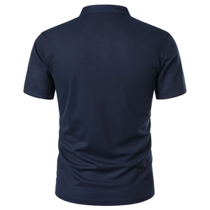 Detail view of the breathable pique fabric and back structure of a navy blue polo shirt