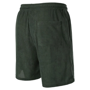 Detail of dark green corduroy shorts showing back pocket and elastic drawstring waistband