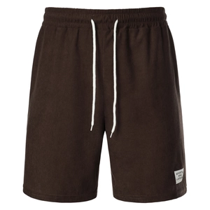 Detail of dark brown corduroy texture and adjustable white drawstring on casual shorts