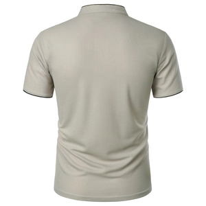 Detail of light khaki men's polo shirt back showing piqué texture and black contrast piping