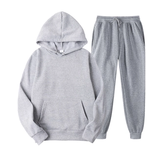 Flat lay of grey fleece hoodie and joggers set with drawstring and kangaroo pocket