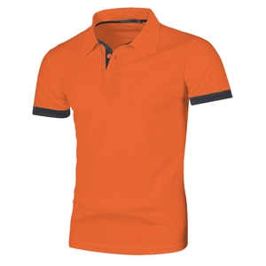 Detail of vibrant orange men's Polo shirt featuring navy blue collar and sleeve trim