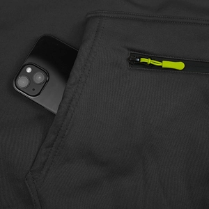 Detail of deep grey hoodie featuring a large side pocket and vibrant lime green zipper cord