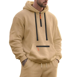 Detail of sand khaki men's heavy fleece hoodie with quarter zip and orange zipper pocket