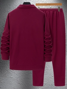 Detail of maroon waffle knit texture on slim fit men's cardigan jacket and pants set